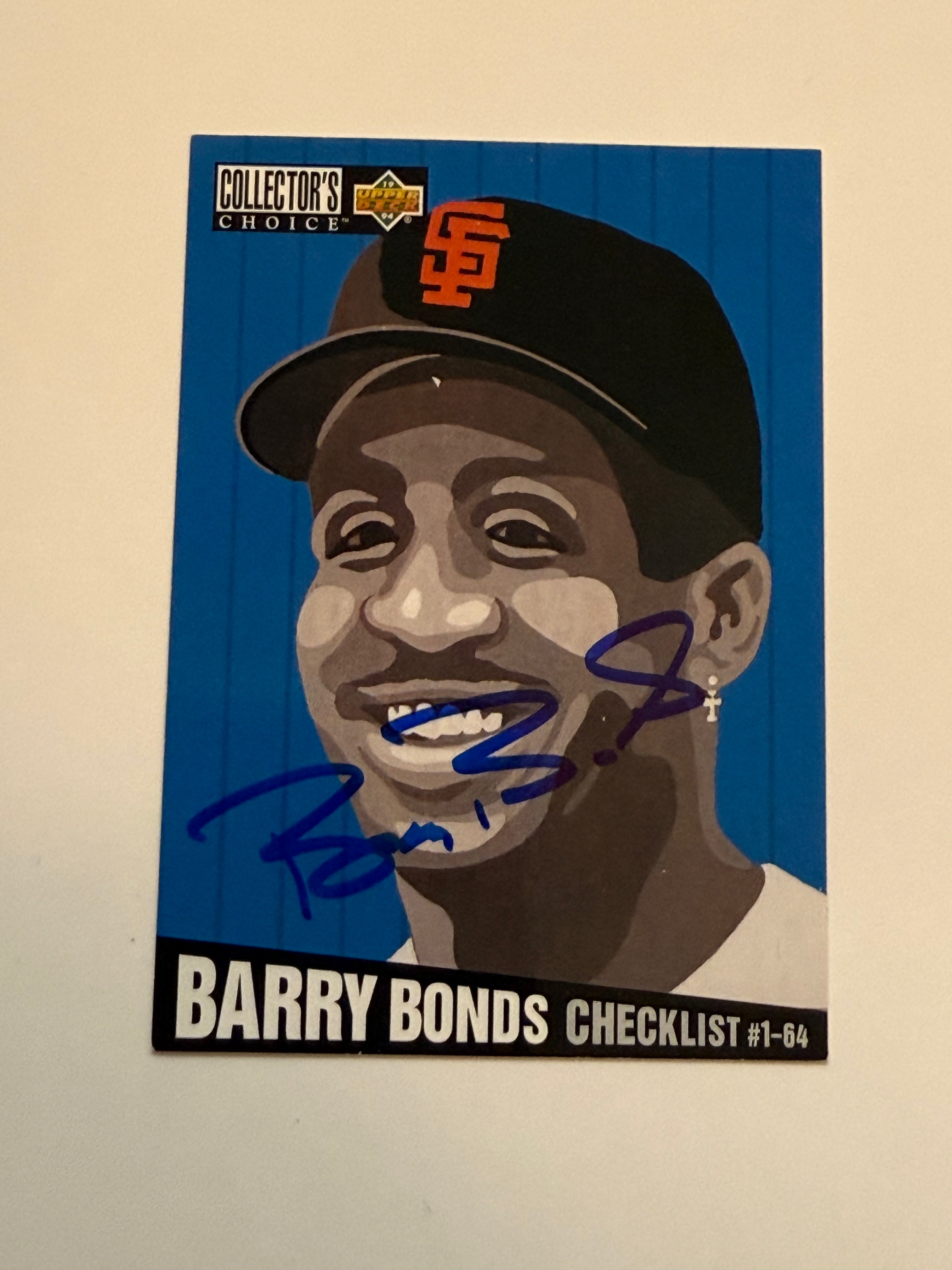 Barry Bonds autographed baseball card with COA