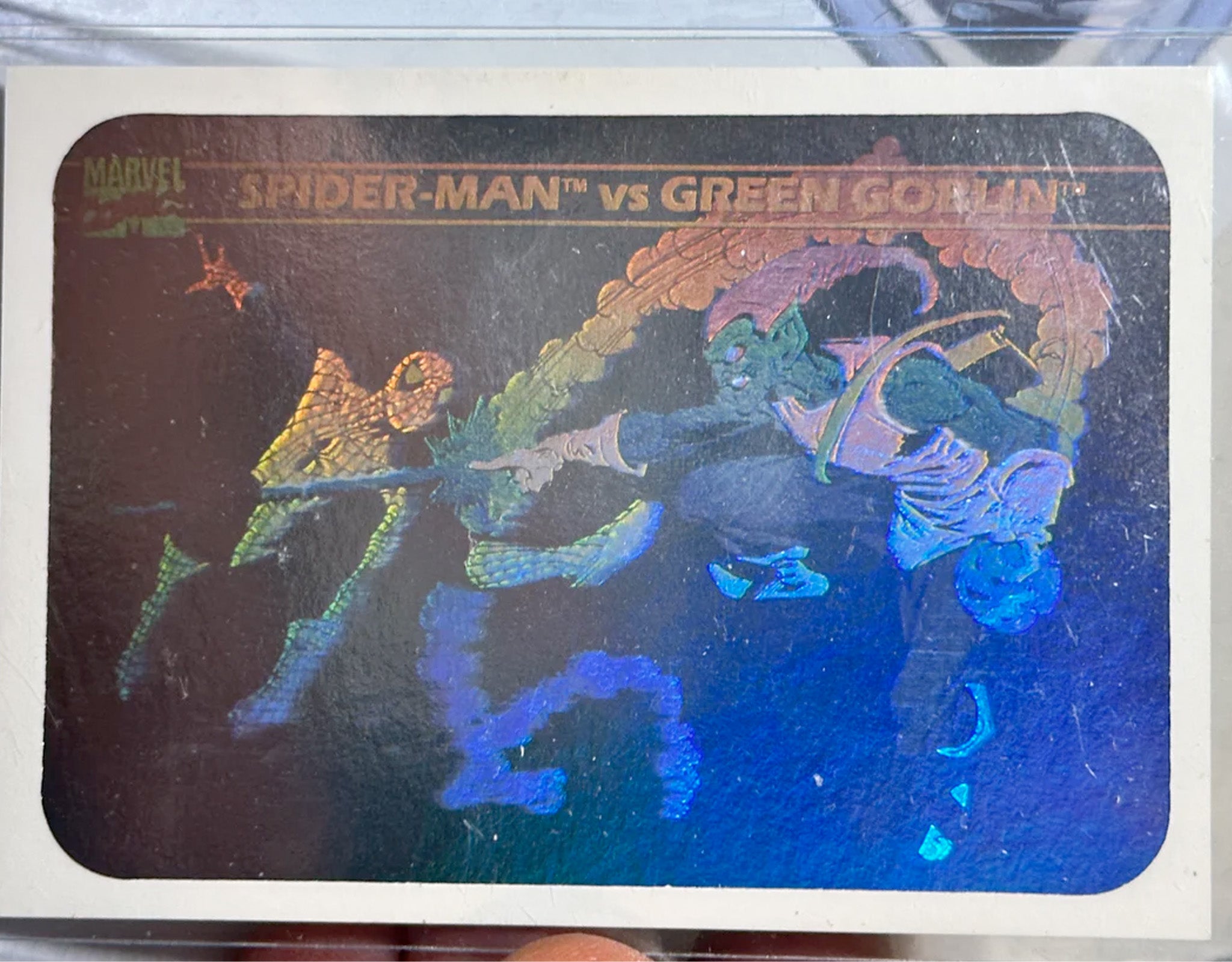 Marvel Spider-Man vs Green Goblin card with colorful design