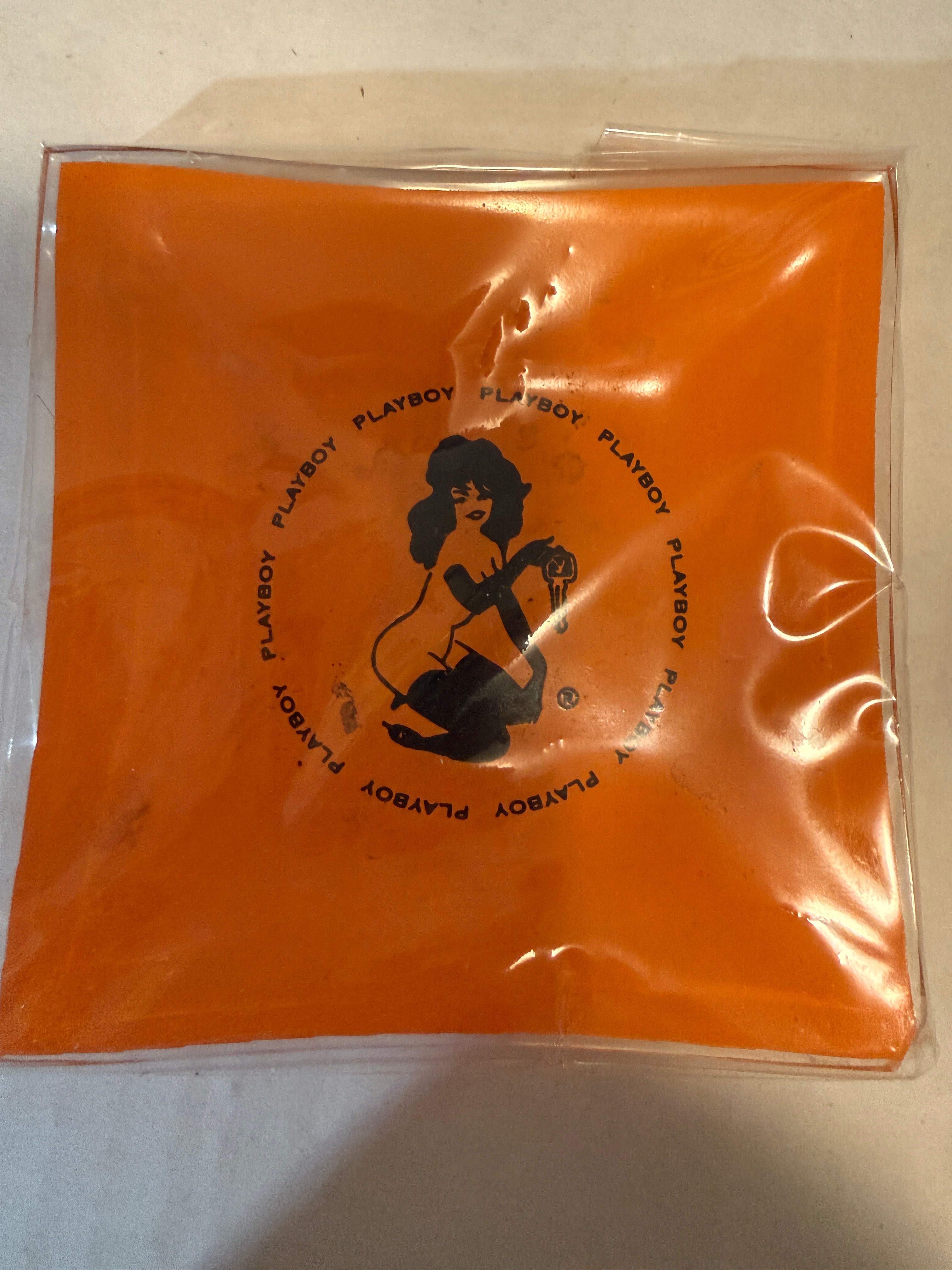 Playboy original vintage orange glass ashtray from 1970s
