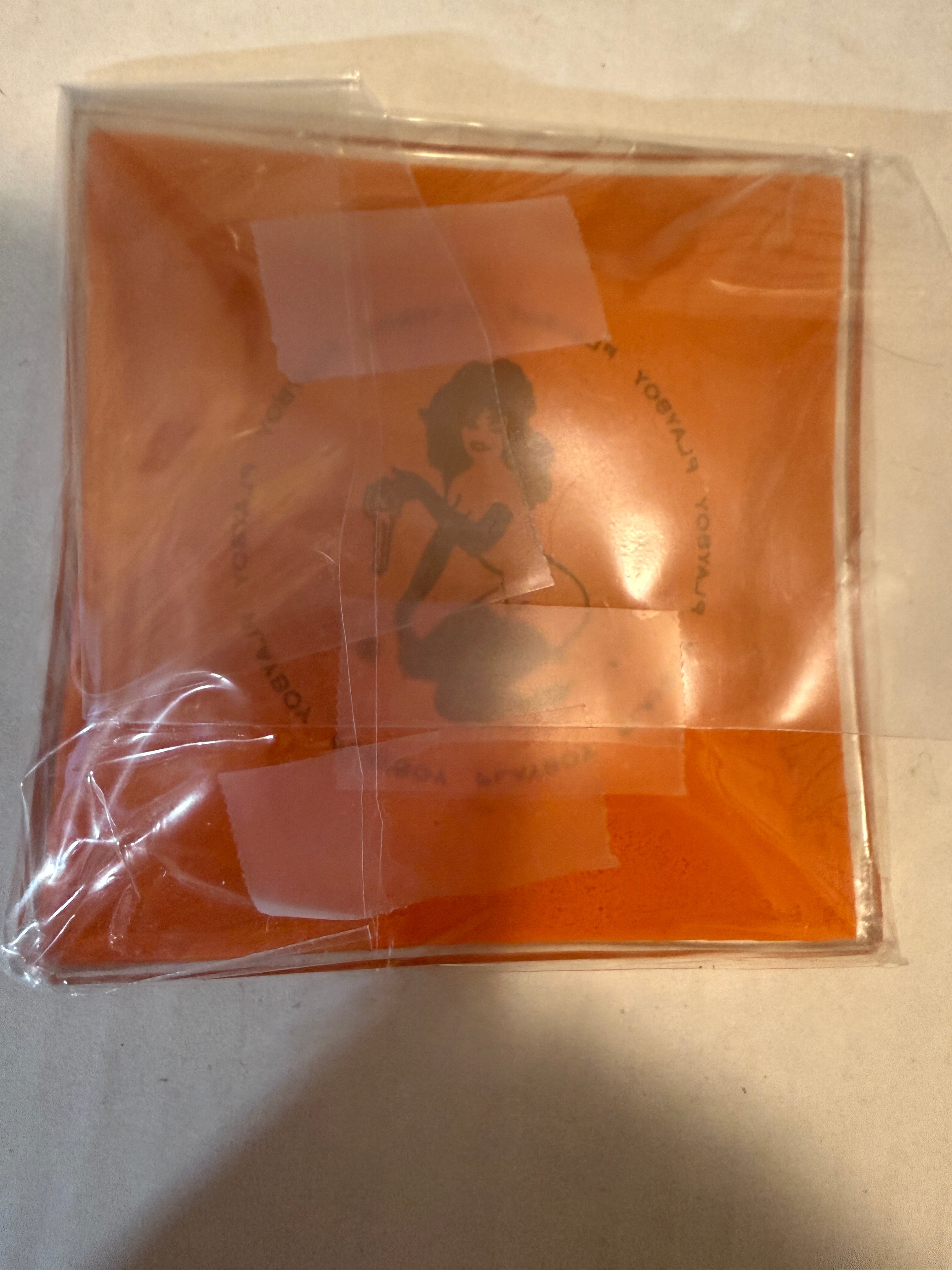 Playboy original vintage orange glass ashtray from 1970s