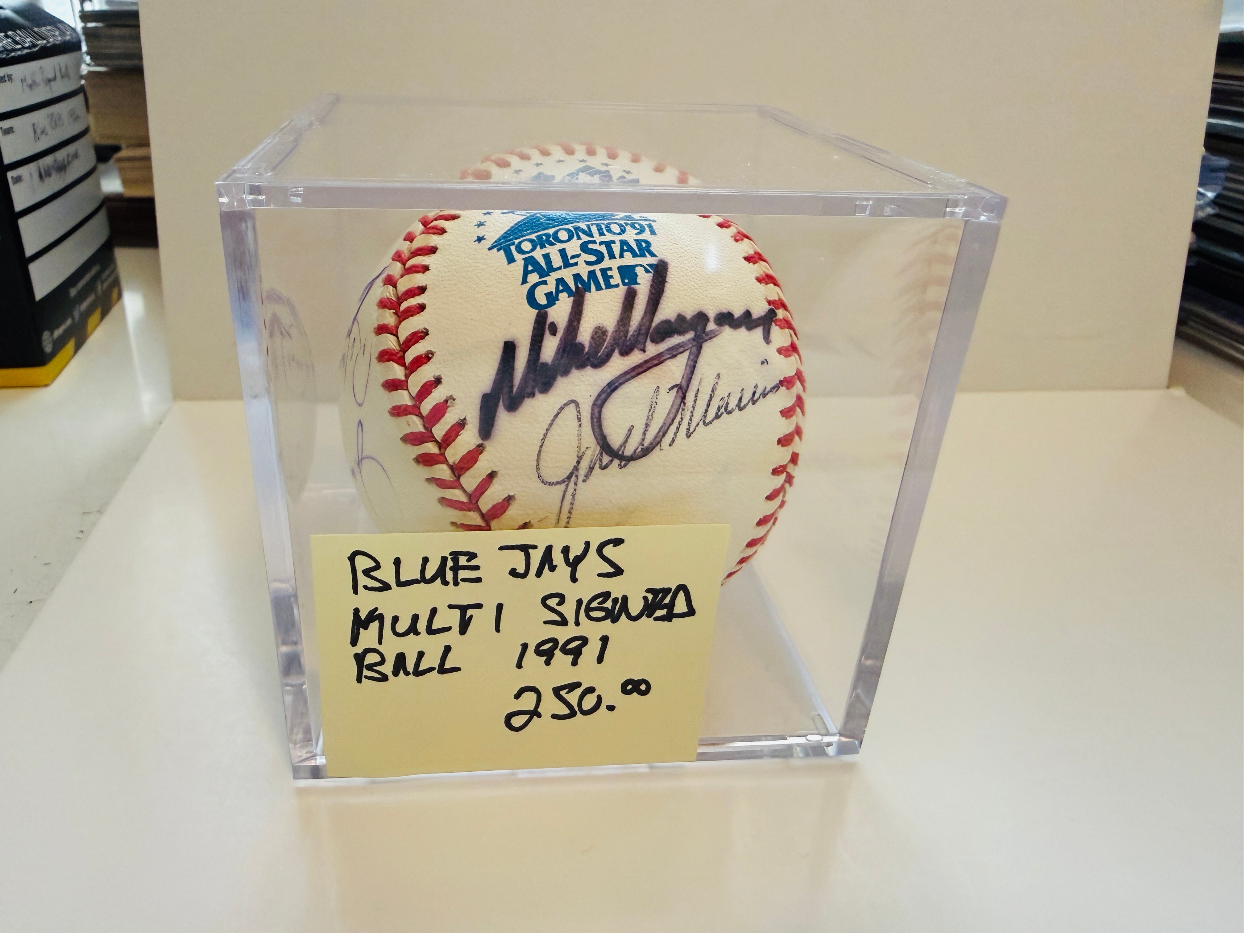 Blue Jays All-Star game multi autographed baseball in cube. Carter,Alomar, and more greats certified.