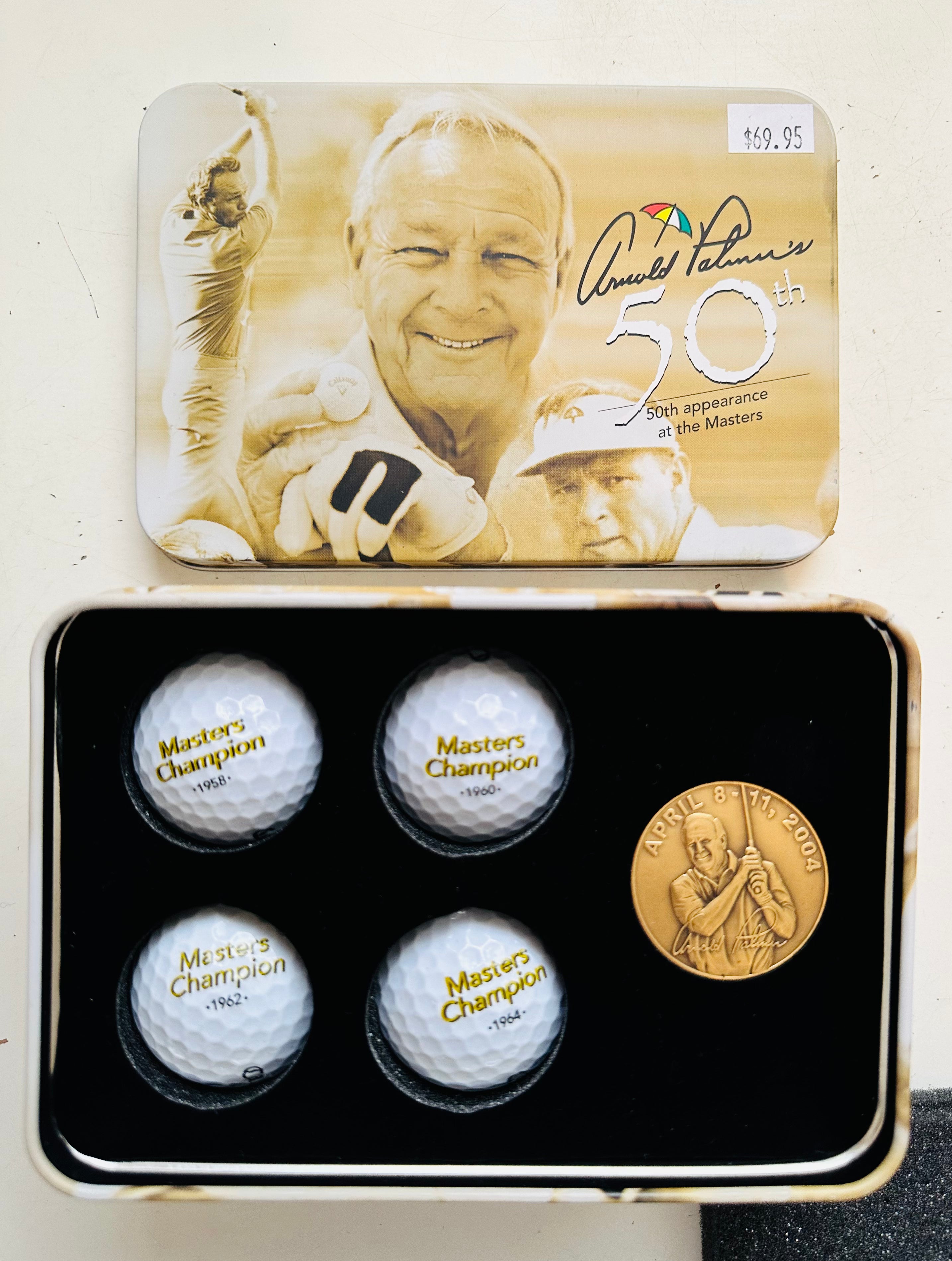 Golf Legend Arnold Palmer 50th Masters limited issued golf balls and coin tin.