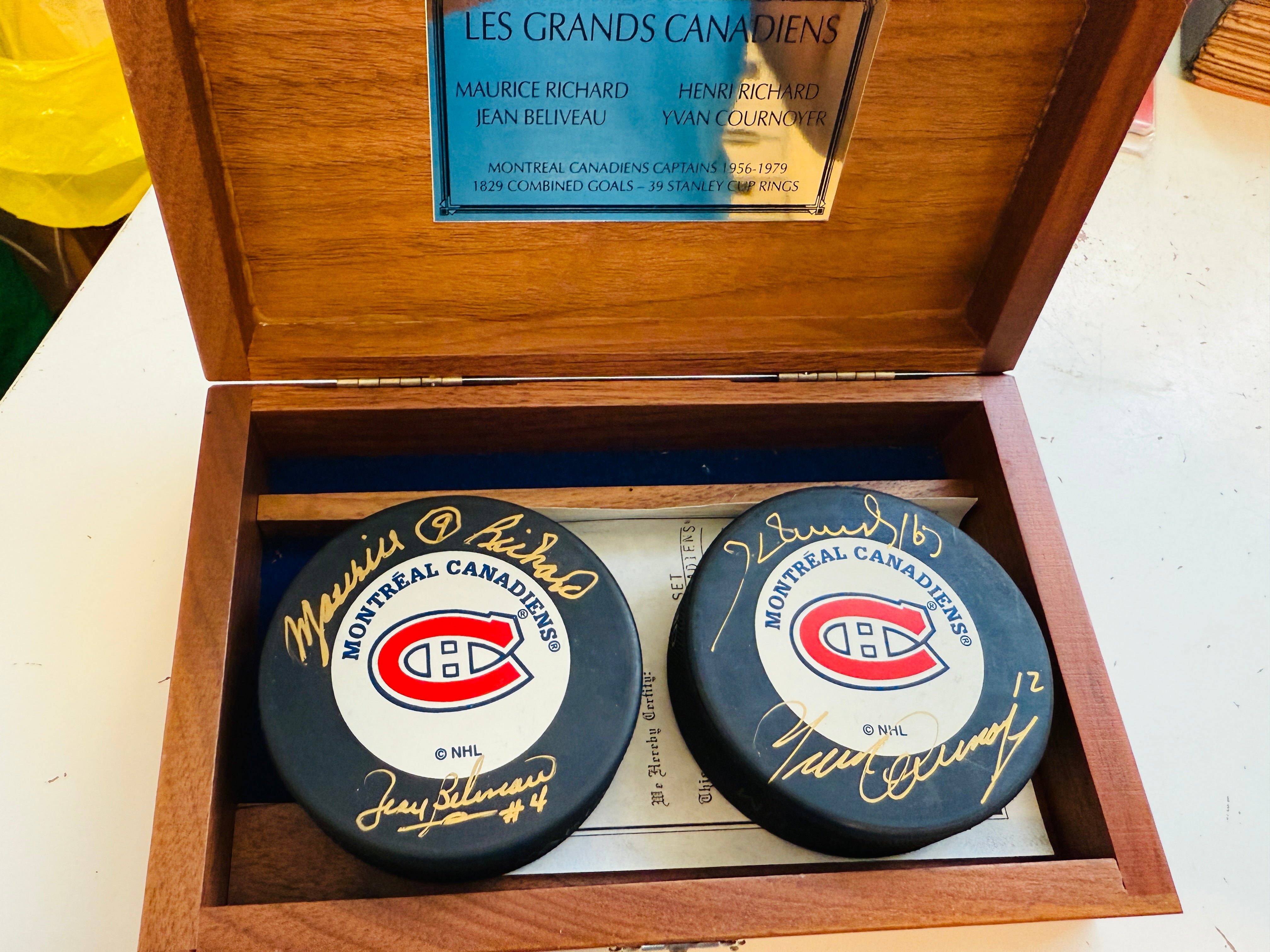 Montréal Canadiens hockey legends two autographed pucks withCOA in wooden display holder