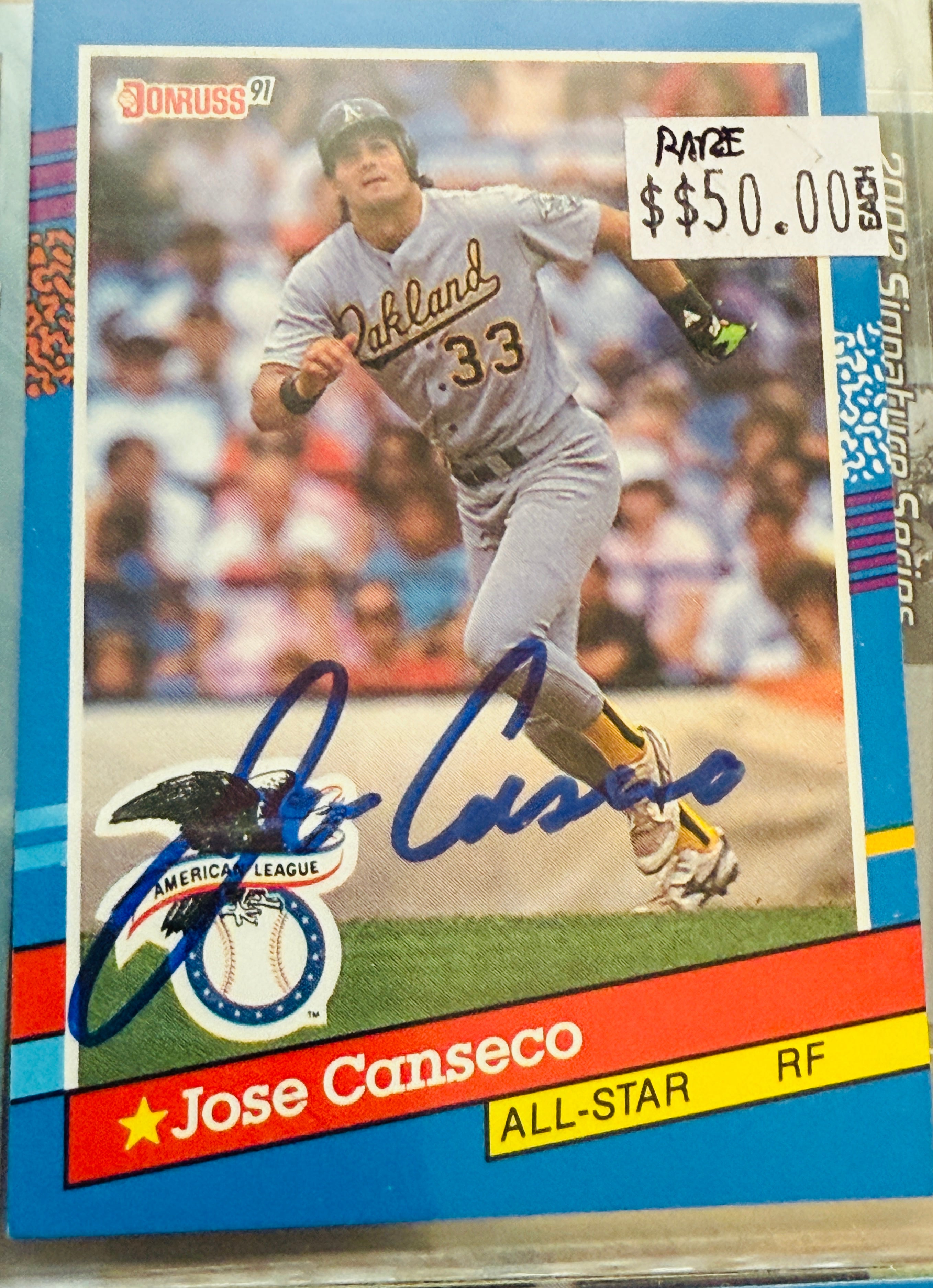 Jose Conseco autographed baseball card with COA