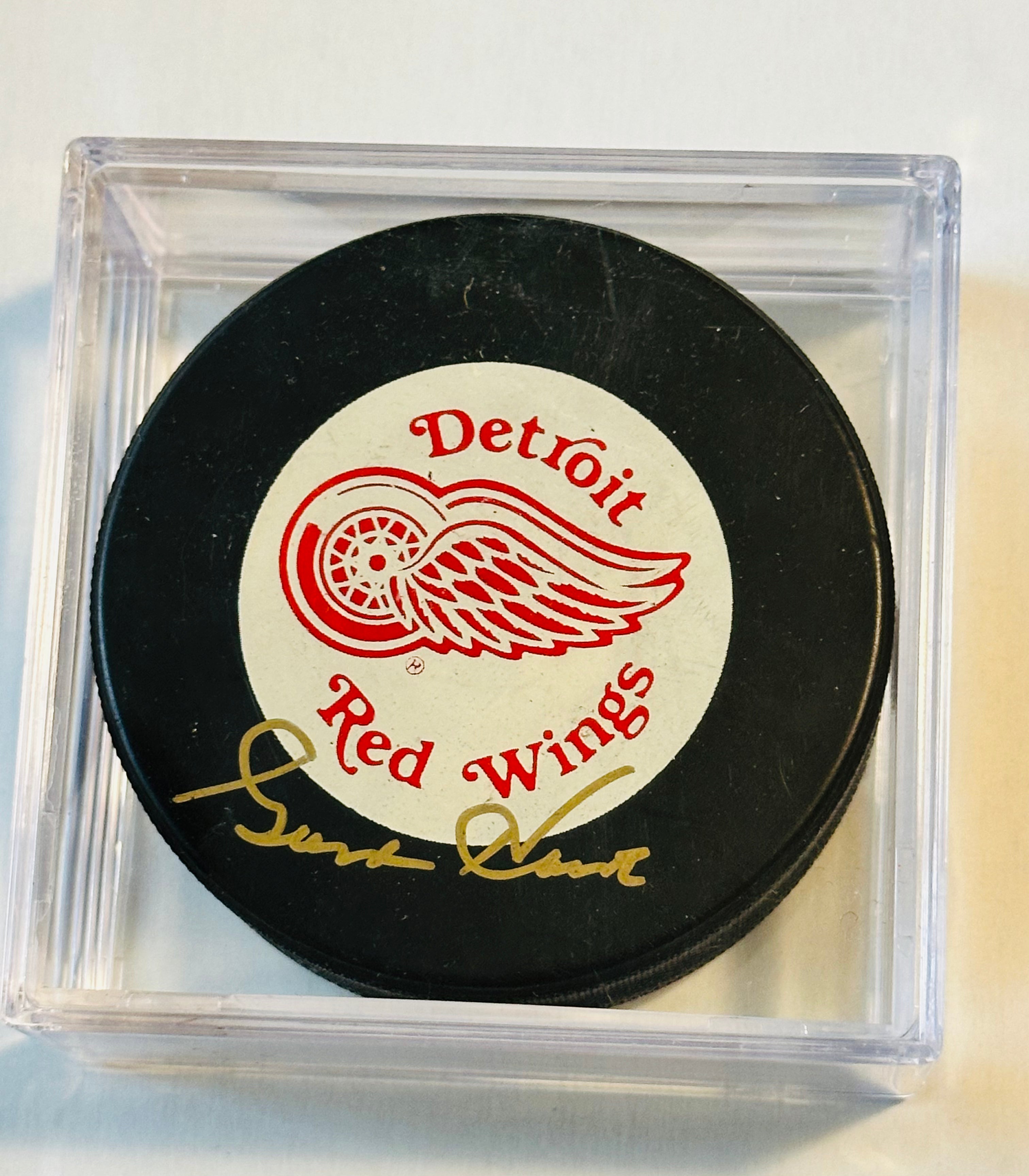 Gordie Howe signed in person hockey puck with holder and case with COA