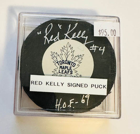 Red Kelly Hockey, legend autograph Puck with puck holder sold the COA