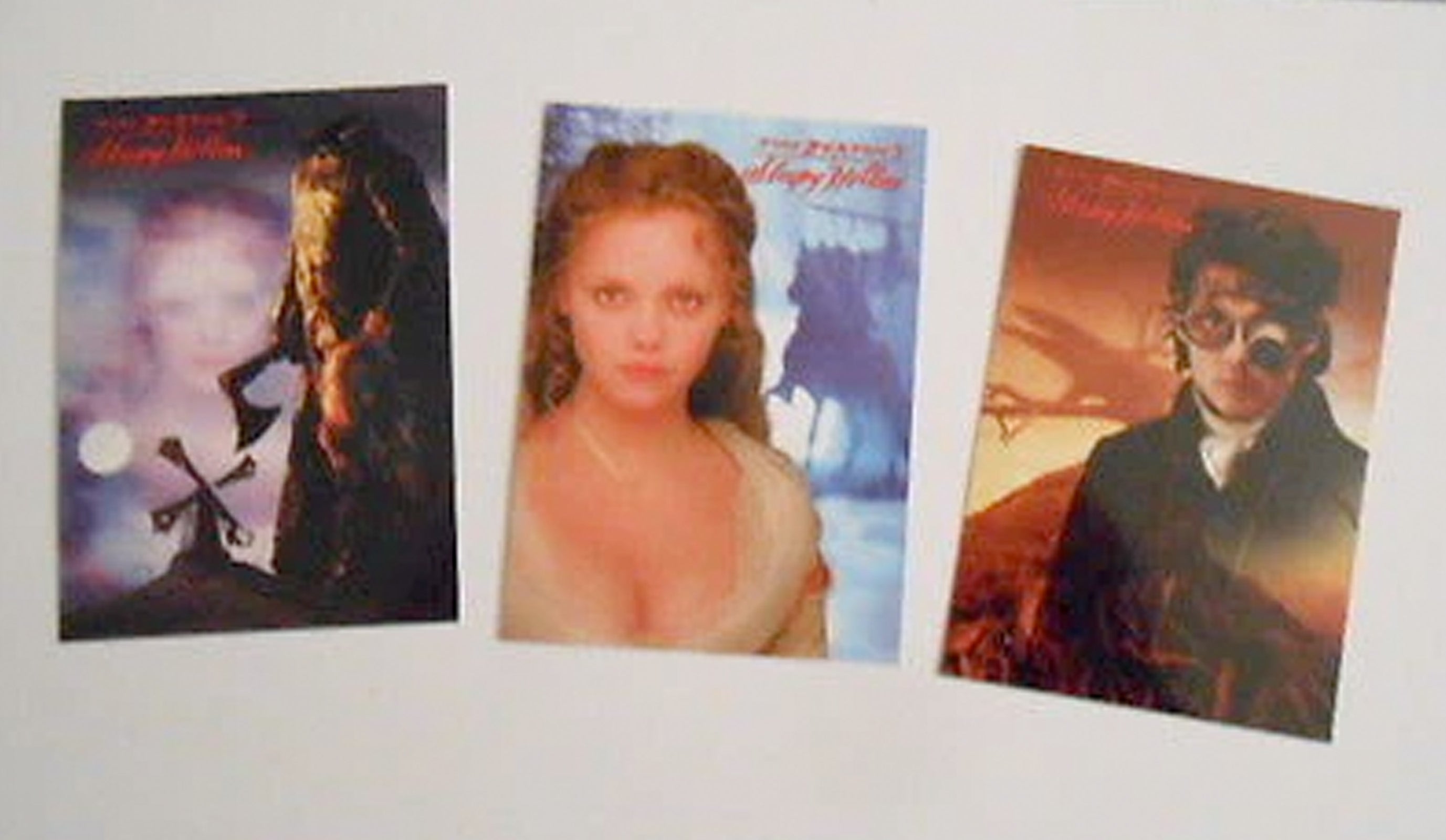 Three trading cards featuring characters from Sleepy Hallow movie on a white background.