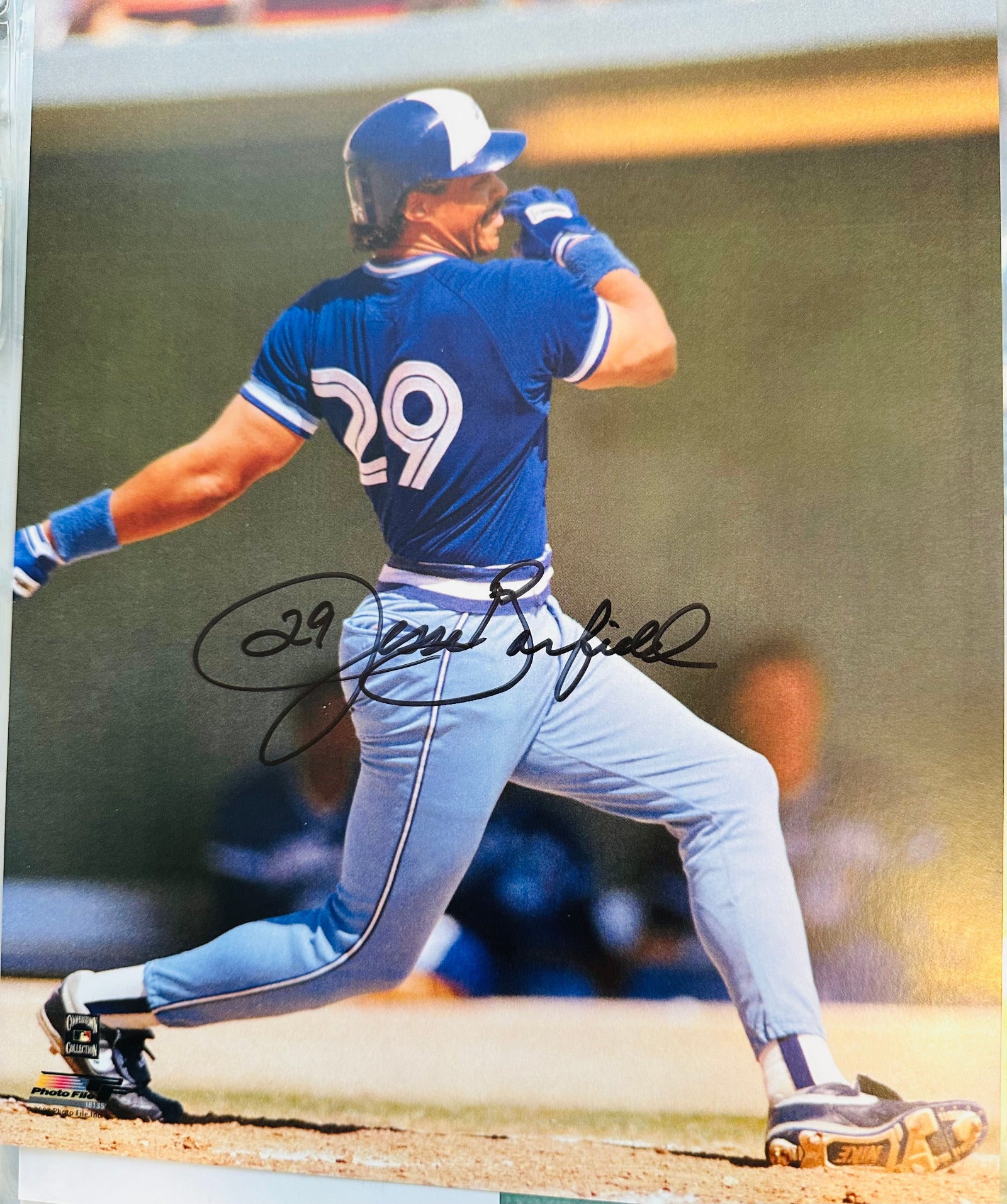 Signed 8x10 photo of a Toronto Blue Jays baseball player in uniform, with his signature on the front.