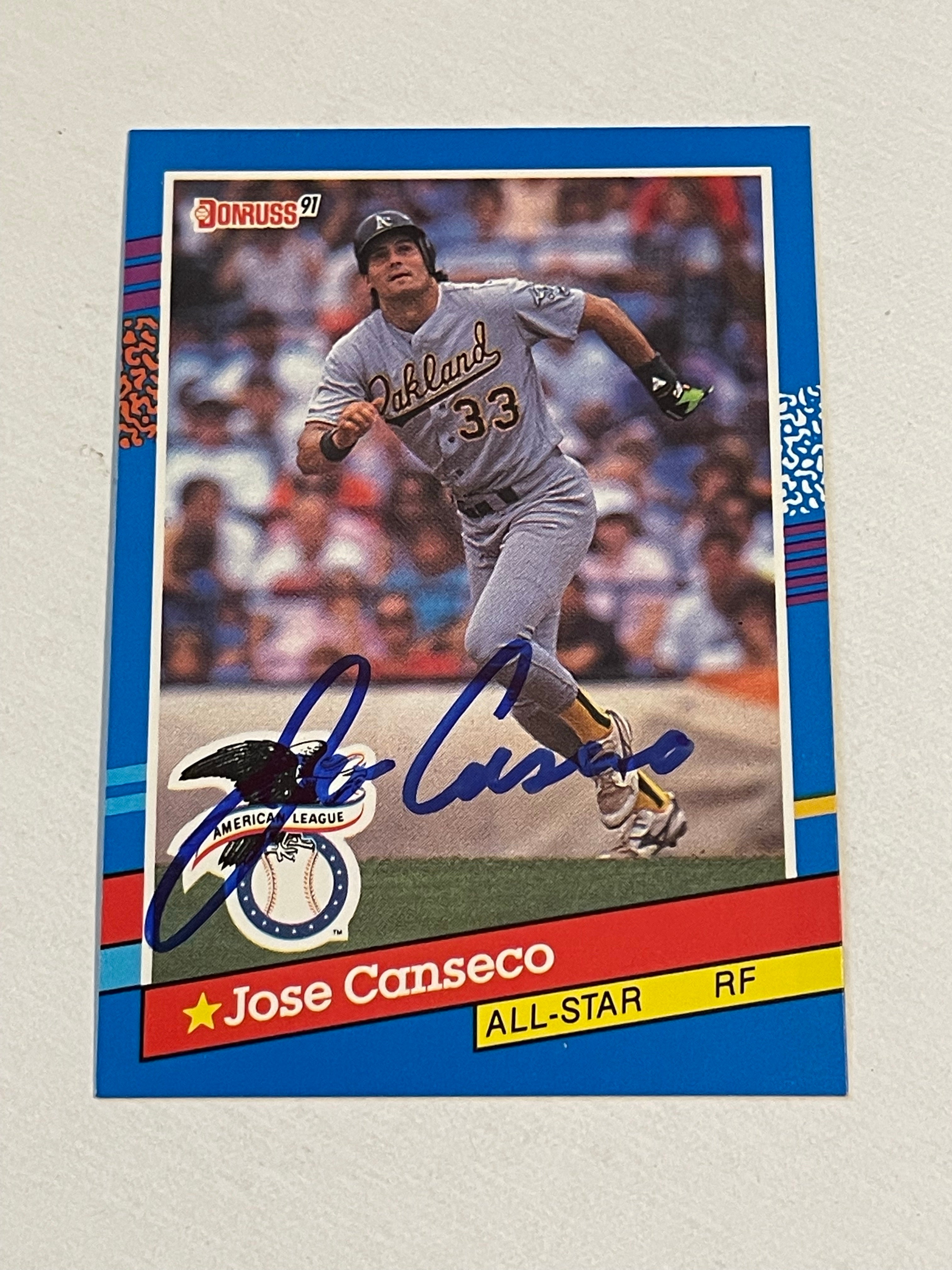 Jose Canseco autograph baseball card with COA