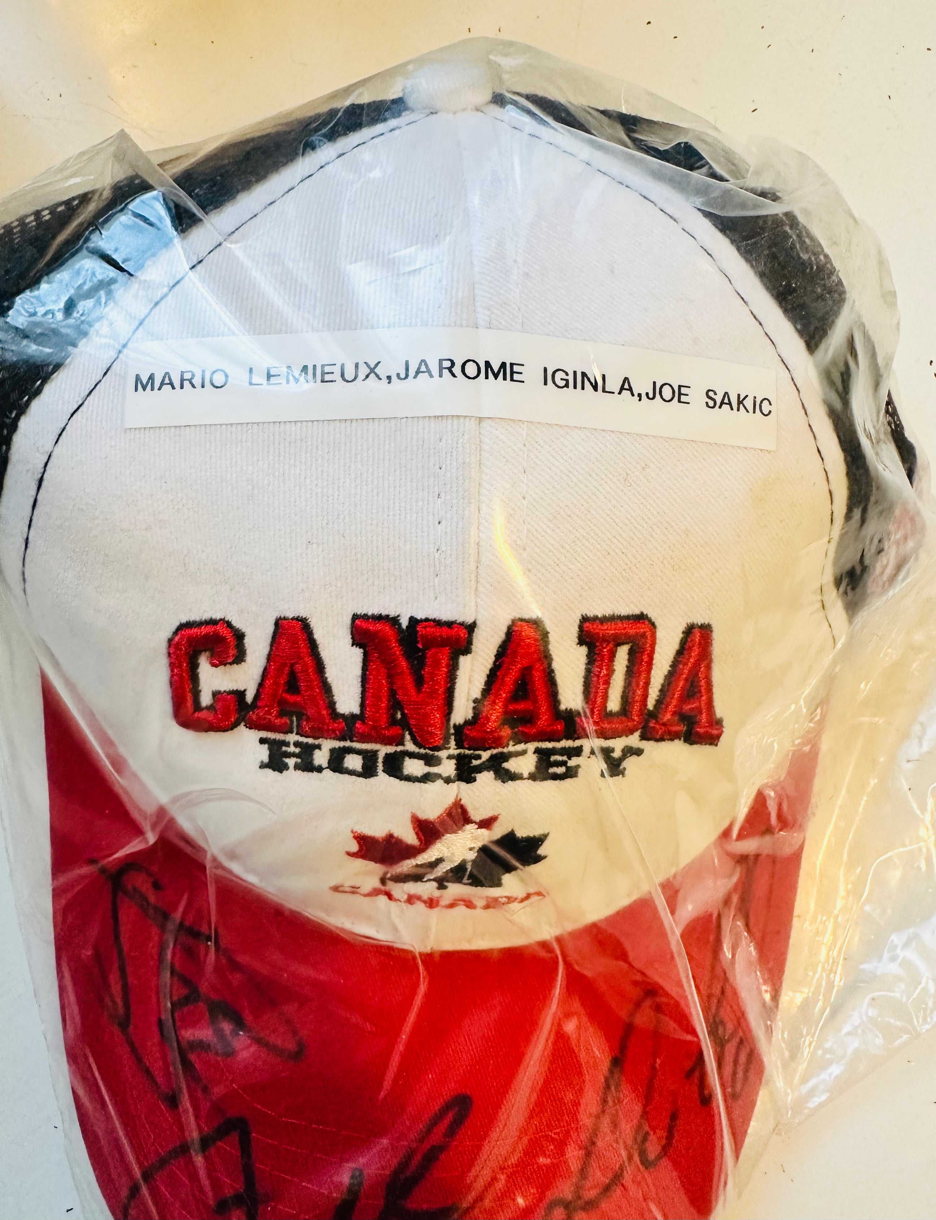 Team Canada Rare triple autograph hat by Mario Lemieux, Sakic and Iginla hat sold with COA