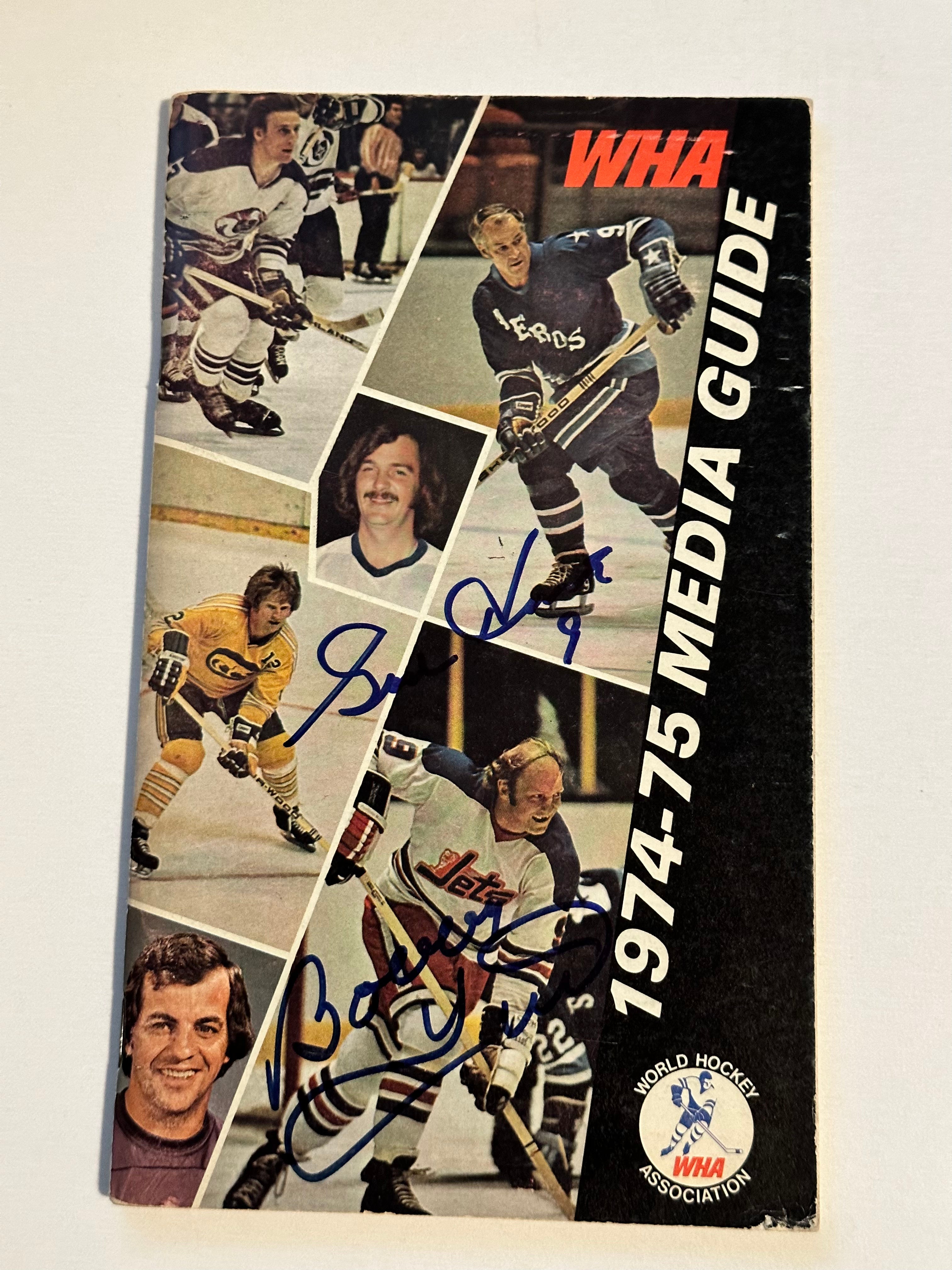 Bobby Hull and Gordie Howe WHA hockey autographed media guide with COA